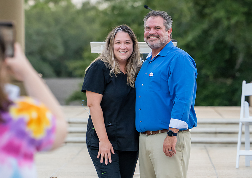 Couple posing for picture.