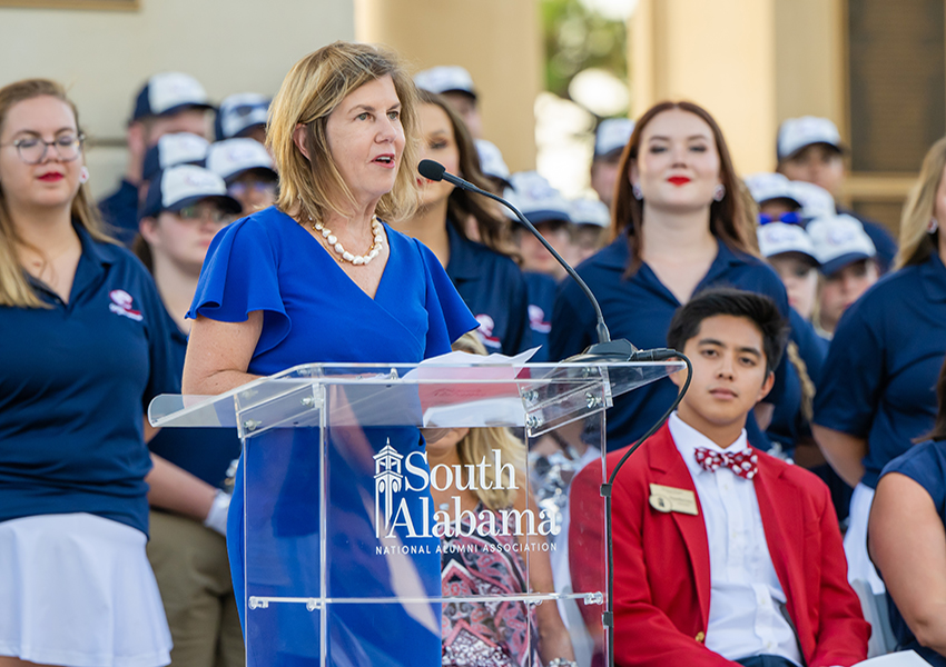 Margaret Sullivan speaking at podium.