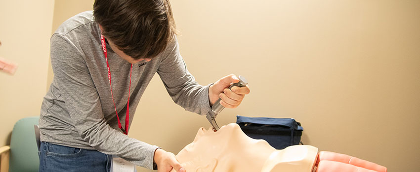 Student practices incubating in simulation lab.