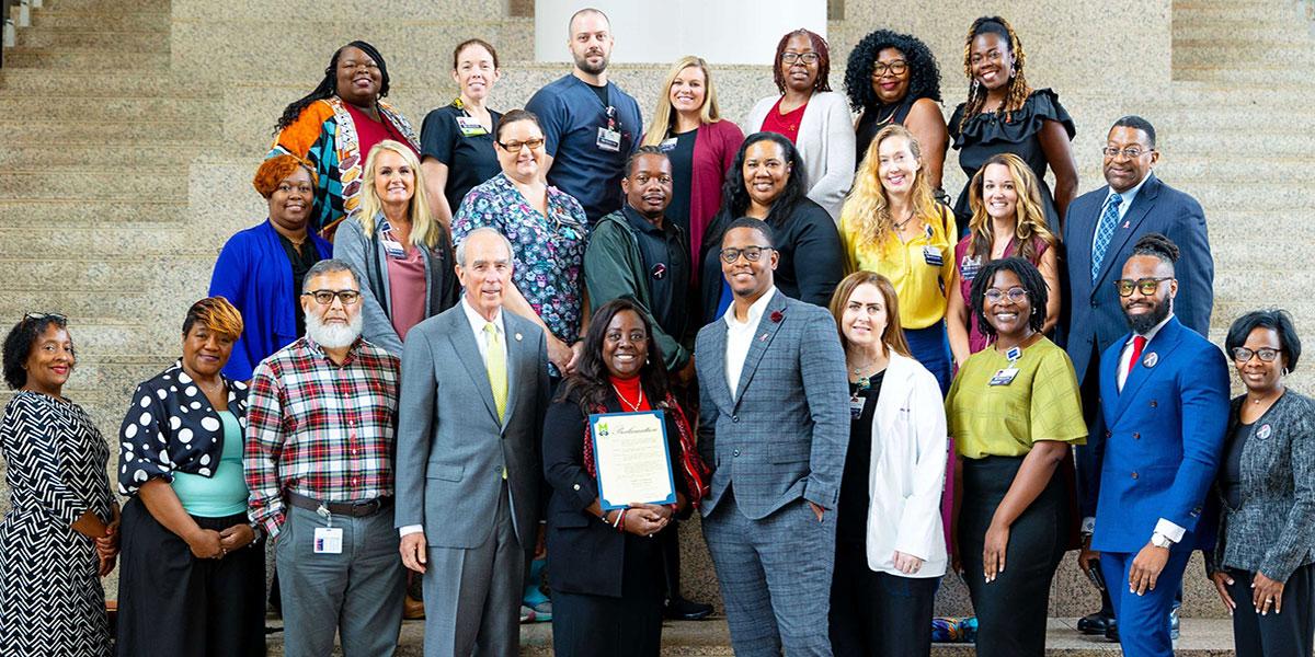 September is National Sickle Cell Awareness Month and the City of Mobile issued a proclamation recognizing the observance.  Representatives of the USA’s Johnson Haynes Jr. Comprehensive Sickle Cell Center, including Ardie Pack-Mabien, Ph.D., FNP-BC, director;Antwan Hogue, M.D., medical director; and Hamayun Imran, M.D., division chief of pediatric hematology/oncology; received the proclamation from Mayor Sandy Stimpson during the city council meeting. 