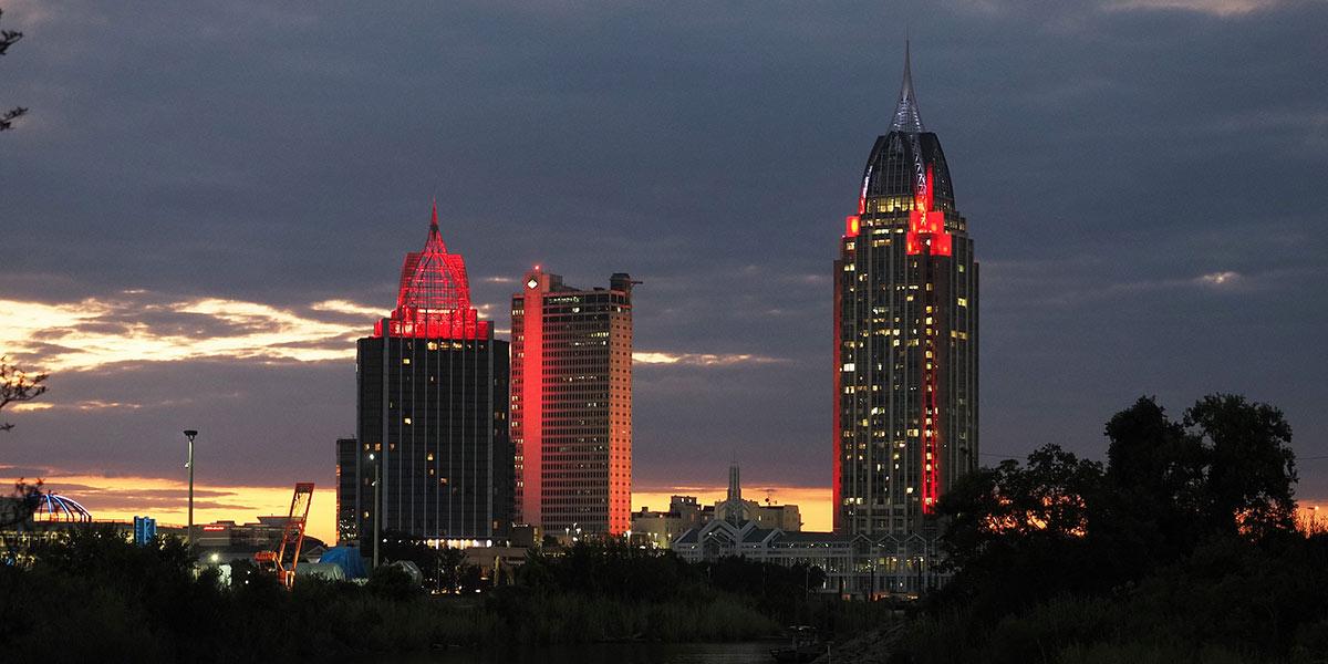 RSA Tower in downtown Mobile, Alabama lit red to recognize Sickle Cell Awareness Month on Sunday, September 8, 2024