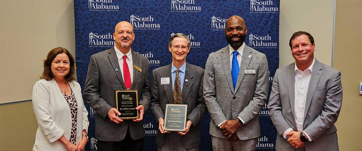 Group image of award recipients with Dr. Paige Vitulli.