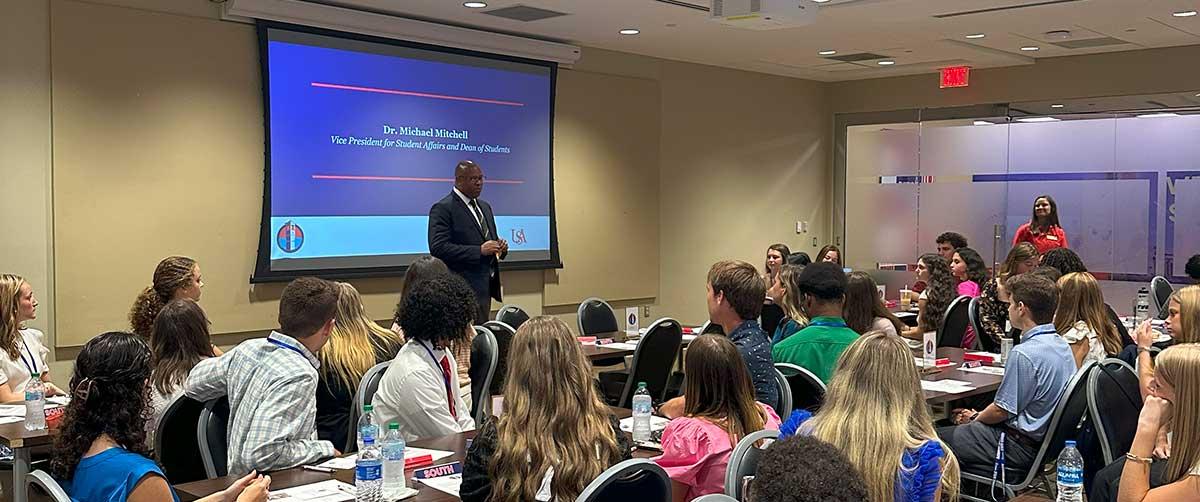 Students hearing from Dr. Michael Mitchell the Vice President of Student Affairs and Dean of Students