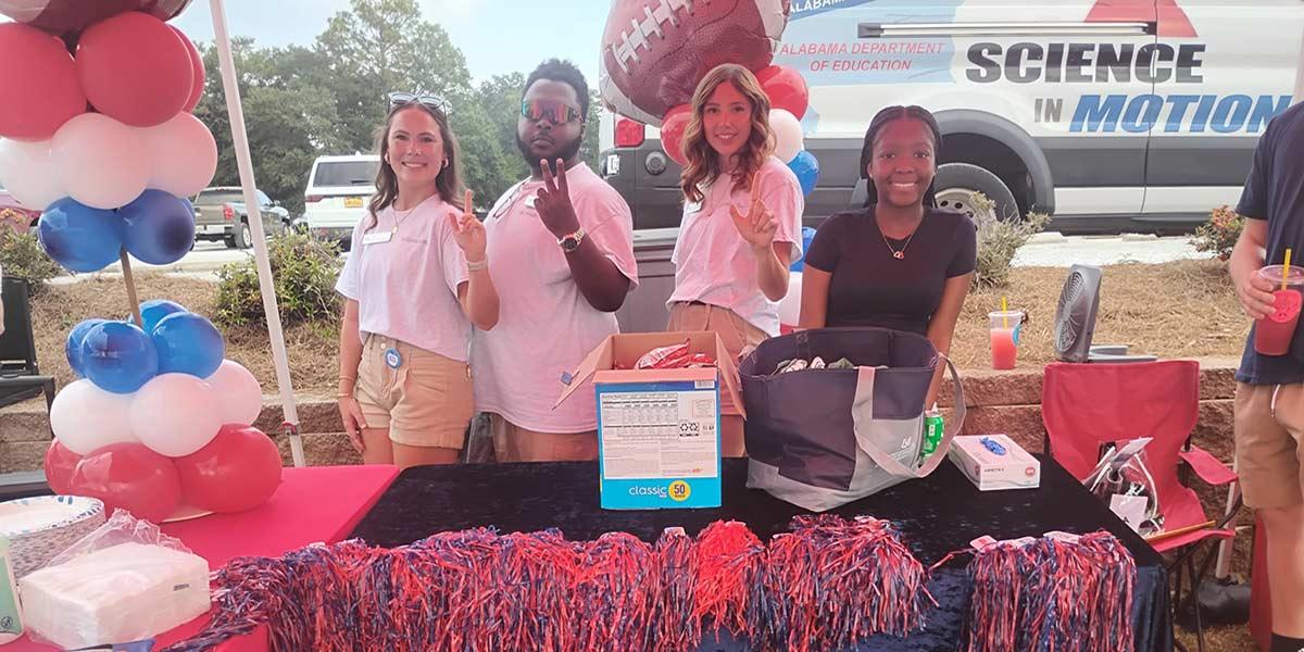 CEPS Ambassadors behind table