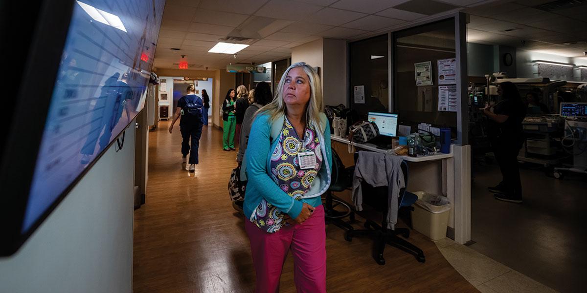 IN A PLACE where conditions can shift quickly, nurses stay ahead by absorbing information wherever they are, even in the brief steps between one pod to the next. Some infants arrive here, in the region’s only Level III NICU, at just 21 weeks and 5 days — an age when survival depends on a highly specialized team and environment.
