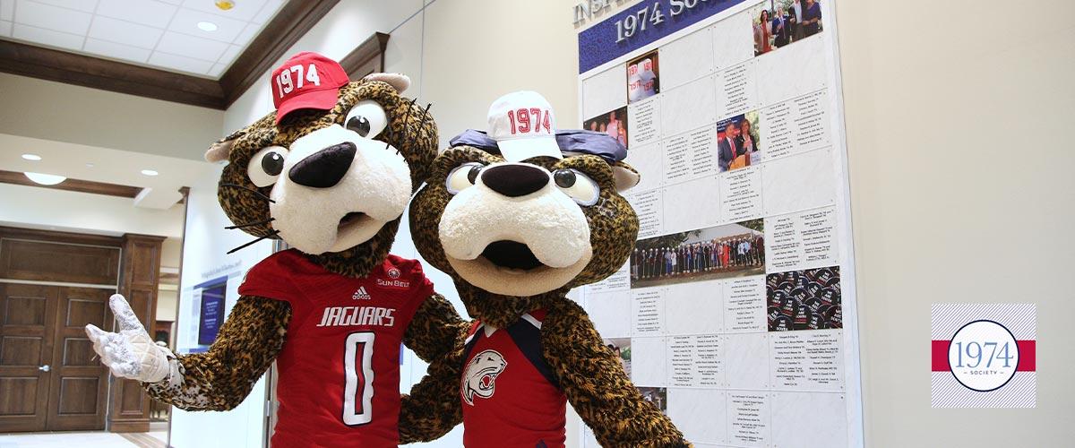 Southpaw and Ms. Pawla wearing 1974 hats.