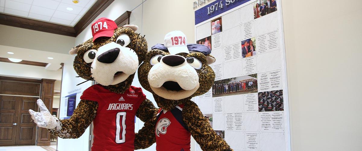 Southpaw and Ms. Pawla wearing 1974 hats.