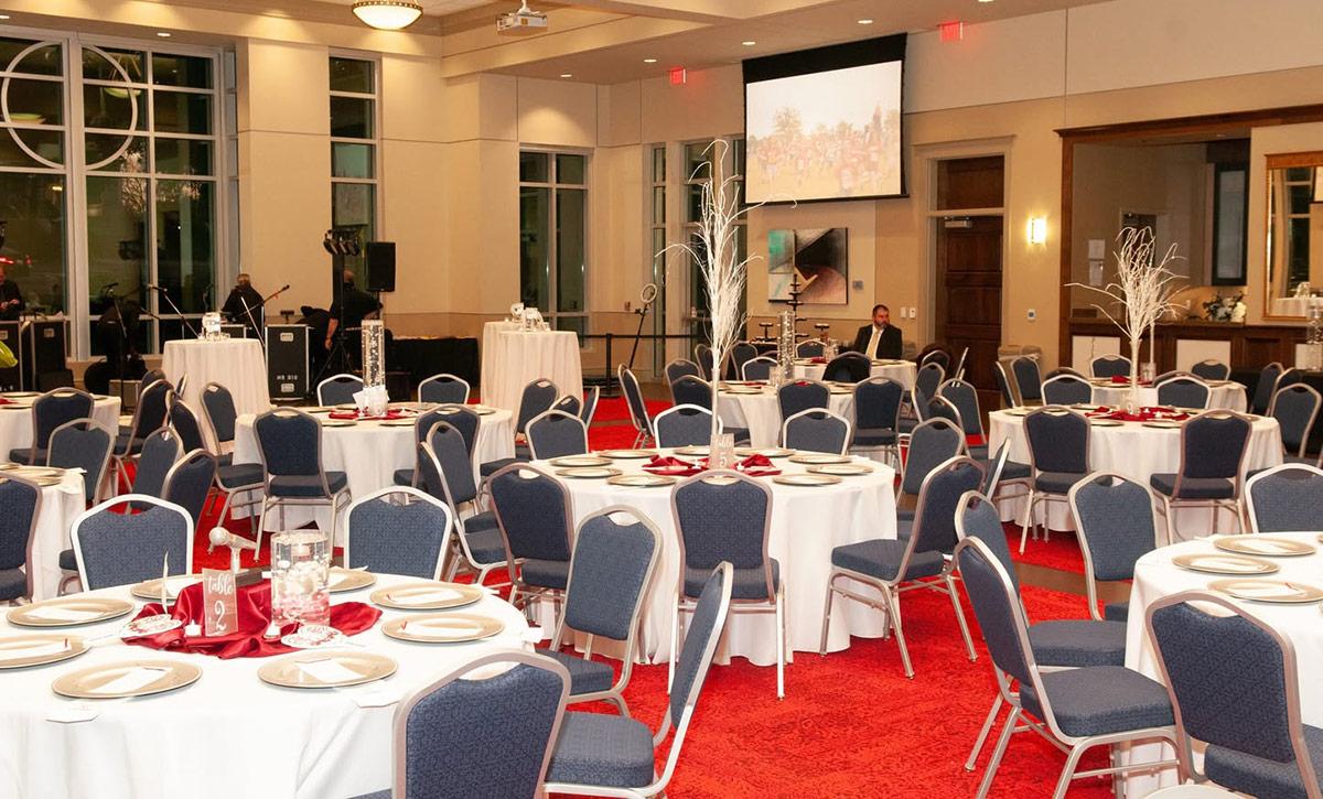 Tables and chairs set up for event.