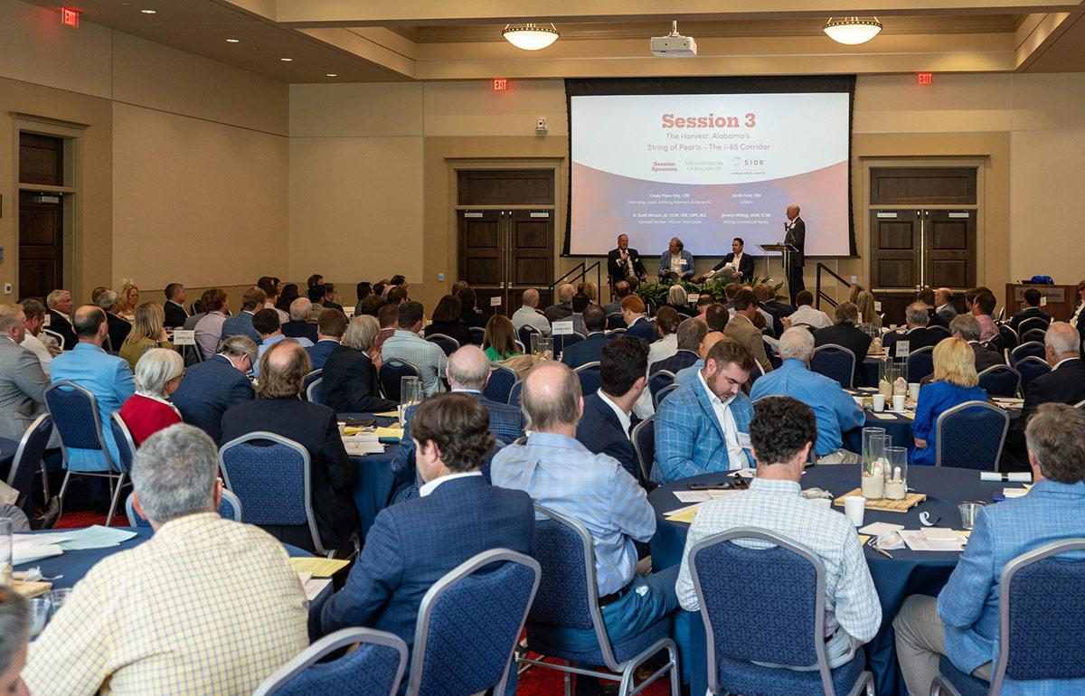 USA Real Estate conference showing the ballroom filled with participants.