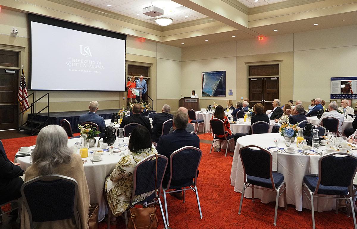 Dr. Kent and President Bonner speaking at Legacy Society meeting.