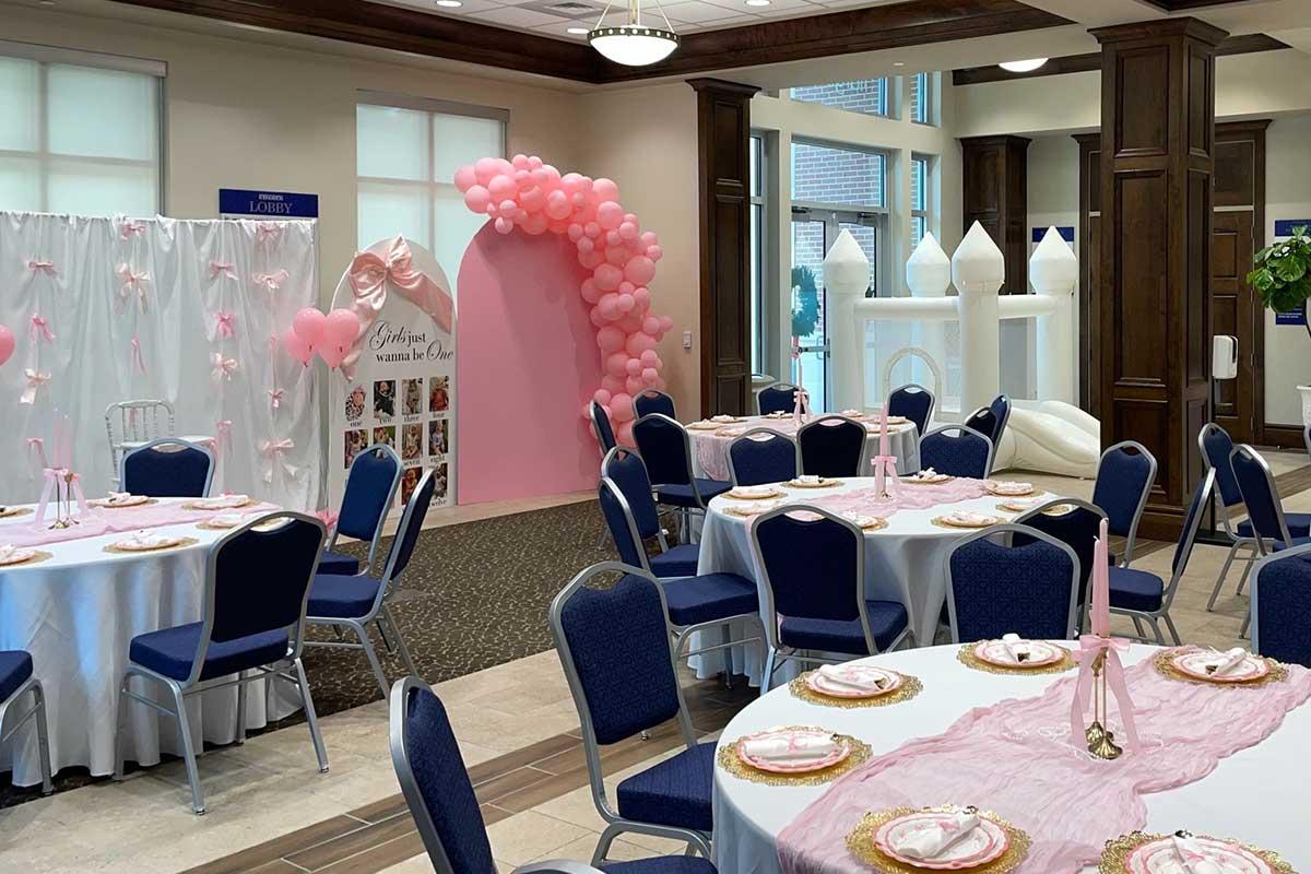 Room set up for baby shower with themed decor