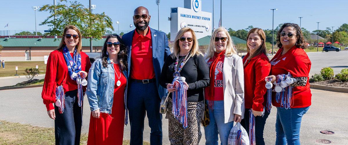 Alumni board tailgating.