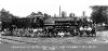 Group poses with GM&N locomotive, about 1920