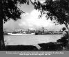 man looking at Mobile's waterfront just before WWII