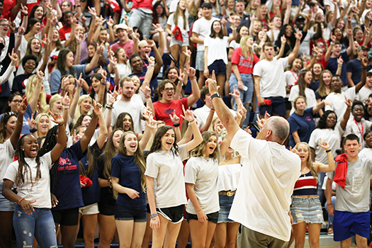 USA football coach talking to freshmen class