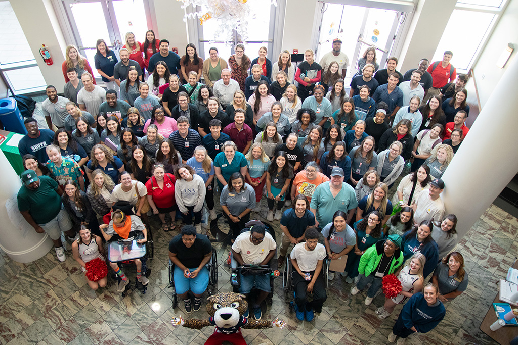 Students, staff, and patients in lobby