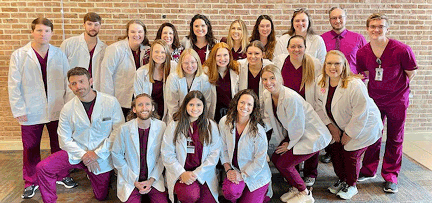 Image of Physician Assistant Studies students in lab.