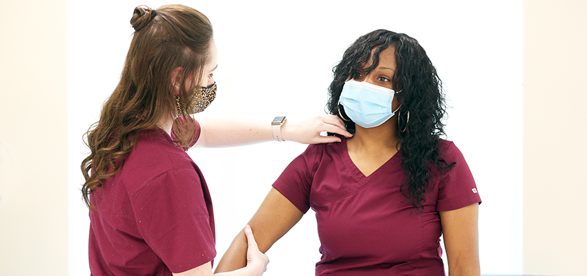 Image of Physician Assistant Studies students in lab.