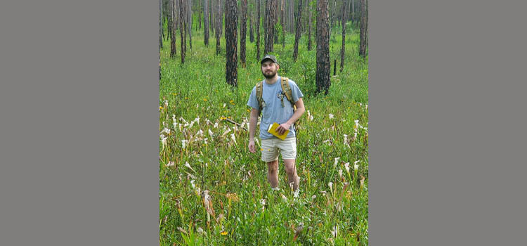 Robin Lloyd standing in Splinter Hill Bog