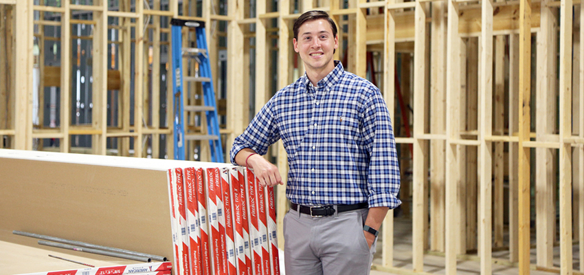 Caleb Santa Cruz, a communication studies graduate, works as a youth pastor at Summit Church, which is constructing a new church building in Foley.