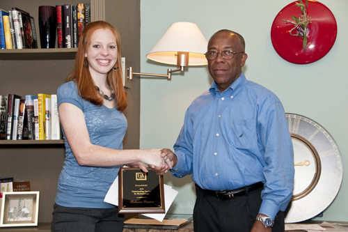 Rebecca Lanier receives the 2010 ExxonMobil Scholarship Award from Richard Benjamin of ExxonMobil.