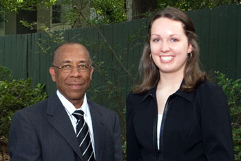 Tara Golden (r), accepts the 2006 ExxonMobil Junior Scholarship Award from Richard Benjamin (l) of ExxonMobil.