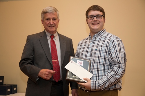 Dr. Bill Williams presents the PowerSouth Academic Scholarship Award to Avery Vice.