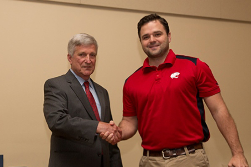 Dr. Bill Williams presents the PowerSouth Academic Scholarship Award to Jonathan Chance.