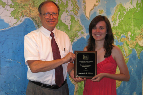 Amanda Billiot receives the 2011 Top Forecaster Award from Dr. Keith Blackwell
