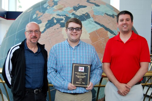 Avery Vice receives the 2018 Top Forecaster Award from Dr. John Lanicci and Andrew Murray.