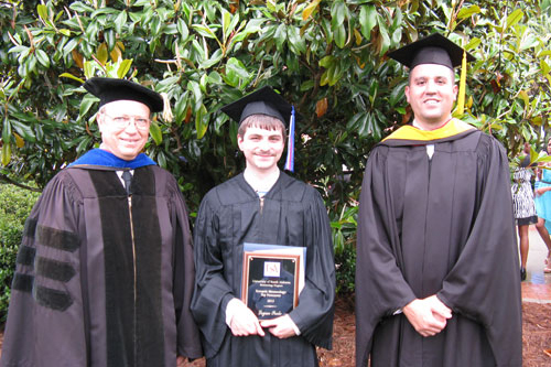 Logan Poole receives the 2013 Synoptic Meteorology Top Forecaster Award from Dr. Keith Blackwell (left) and Andrew Murray (right)