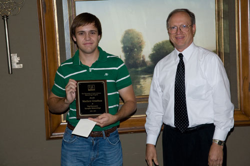 Matt Grantham (left) receives the 2009 Synoptic Meteorology Top Forecaster Award from Dr. Keith Blackwell.