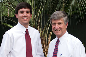 Andrew Murray (l), receives the first Dr. Bill Williams Endowment Scholarship from Dr. Bill Williams (r).