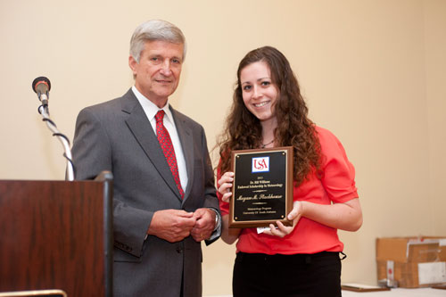 Megan Stackhouse receives a 2013 Endowed Scholarship from Dr. Bill Williams