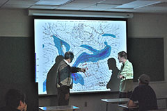 Dr. Blackwell Instructing Student in Synoptic Briefing