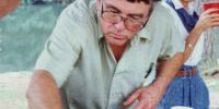 George H. Daniels grills chicken
