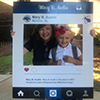 Dr. Amanda Jones with Alex at Mary B Austin with a cut out board in front of them