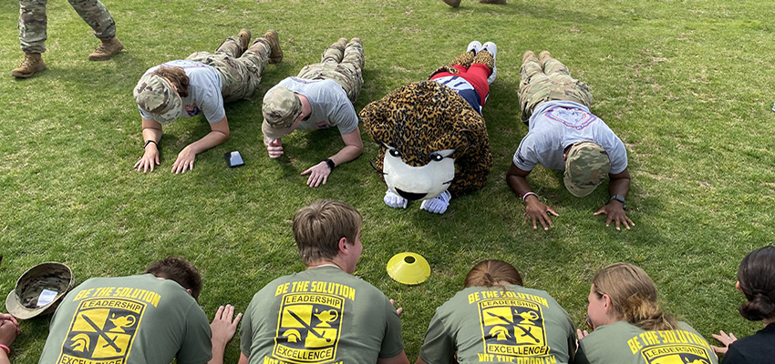 South Army ROTC holding plank position with Southpaw data-lightbox='featured'