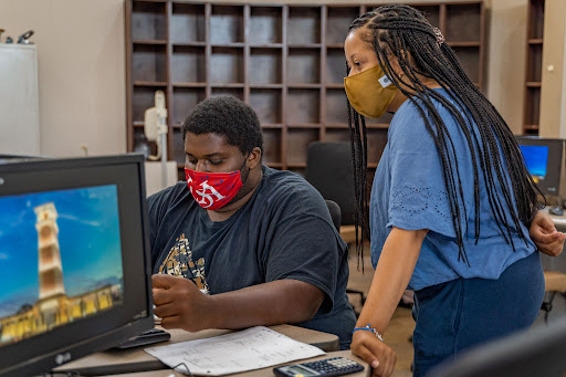 Student working in math labe on computer.