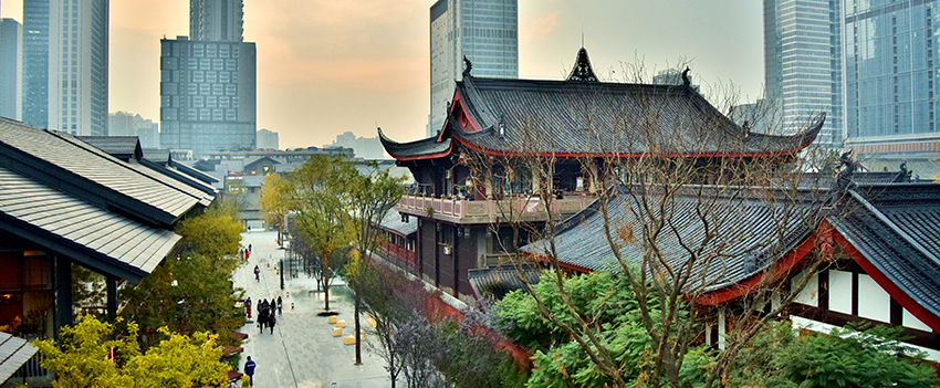 City in China with people walking down the street.