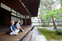 Two people meditating in Japan.