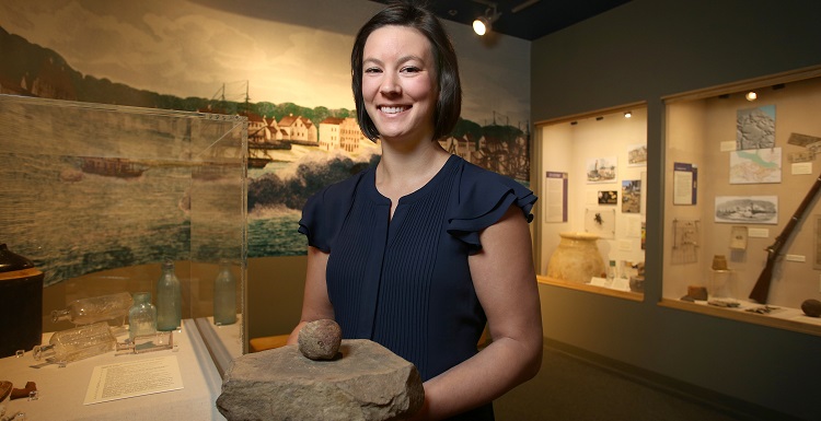 Anne Dorland, who is pursuing a master’s degree in the College of Education and Professional Studies, teaches archaeology lessons at elementary schools through her graduate assistantship.