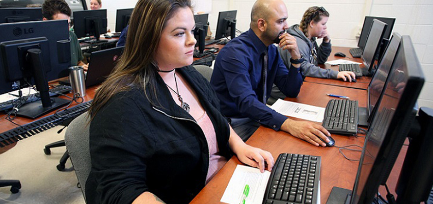 University of South Alabama students and faculty provided the human link between satellite maps and computer software programs Friday to help the American Red Cross deliver food, medicine and other life-saving supplies to Hurricane Maria victims in Puerto Rico.

The Map-a-thon, sponsored by the GeoClub, linked with other universities around the country to outline structures shown on satellite maps at www.openstreetmap.org. Once outlined, the images were uploaded so the Red Cross can use them to determine how much aid will be delivered into areas of the devastated island.

“This is necessary because computer software programs can’t identify structures on satellite maps,” explained Frank Skewes, a senior minor in geographic information systems. “This turns the satellite image into actual countable structures for the Red Cross so they can estimate the amount of supplies to send into a certain area.”

By the end of the afternoon, the 30 or so USA volunteers had uploaded a total of 5,442 images. Still, more help is needed to map the island.

“The Red Cross learned during the Haiti earthquake how vital this is for their relief efforts,” said Dr. Steve Schultze, assistant professor of earth sciences. “People around the world have been helping with this effort, including my own mom in Sunrise, Fla. It’s easy to do, and it’s something almost everyone can do to help with the relief effort.”

Among the volunteers was senior German Cruz-Torres, a native of Toa Alta, Puerto Rico.

“I have talked to most of my relatives there, and they are fine. I have only an aunt I haven’t heard from,” he said. “It is difficult there. People have to stand in line for hours to get gas, or in the case of my sister to get diapers for her two children. Nothing is easy for them now.”

Schultze said help is need for the mapping until all of the island is completed.

“Anyone who does this will be helping people who really need it now,” he said. “Plus, this is a good way for geographers to show people what we really do.”
