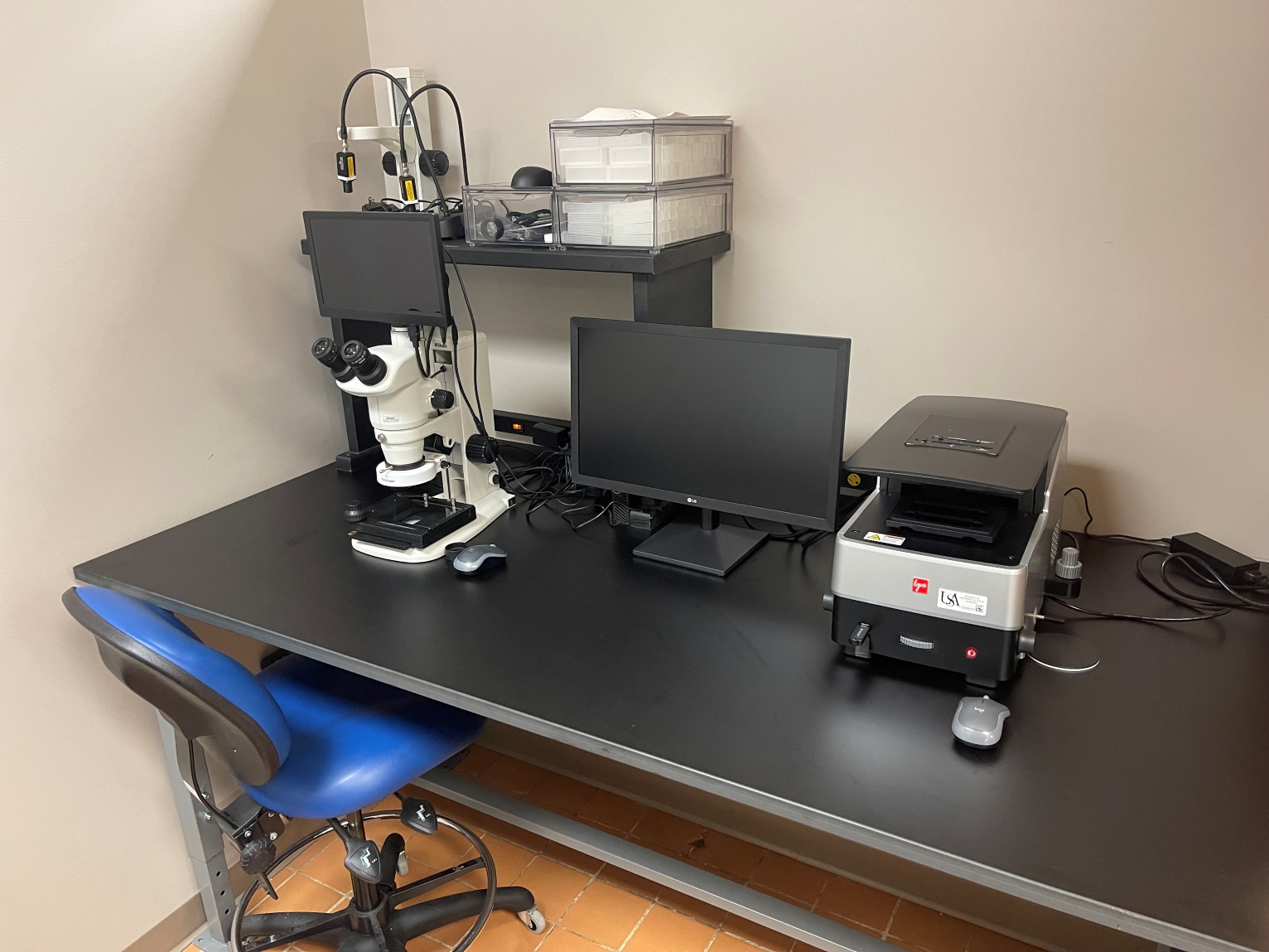 Microscope and digital imaging workstation.