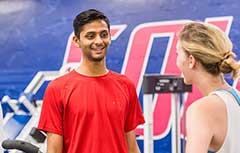 Two students working out at Campus Recreation.