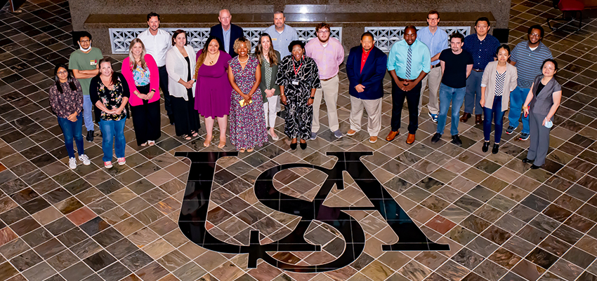  Participants in the second cohort of the Research Experiences for Teachers program photographed at Shelby Hall on campus at the University of South Alabama data-lightbox='featured'