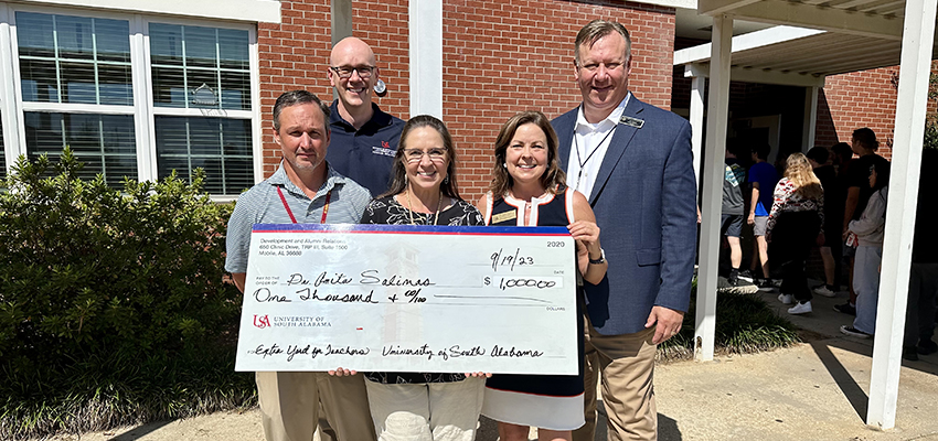 Pictured left to right: William White, principal at Robertsdale High School; Dr. Allan Allday, chair of the University of South Alabama Department of Leadership and Teacher Education; Dr. Anita Salinas, a science teacher at Robertsdale High who received $1,000 for her project titled “Cutting Into Cartilage: Sharks Inside and Out;" Dr. Paige Vitulli, chair of the USA Department of Integrative Studies and NCAA faculty representative for South; and Joe Sharp, assistant superintendent for Baldwin County Public Schools.