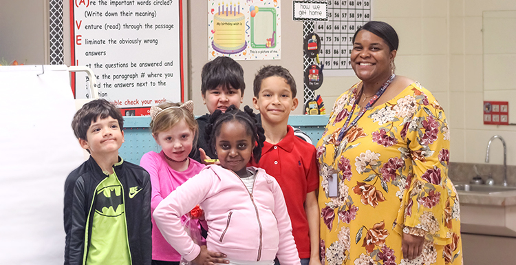 Nina Wansley pictured with students in her classroom