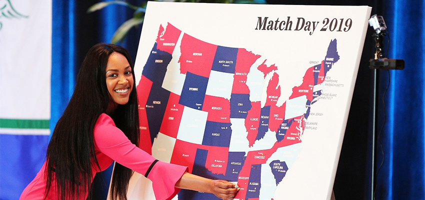 
The USA College of Medicine received approval from the USA Reopening Committee to host an in-person Match Day following a year in which COVID-19 forced the event to go virtual. Students will take turns announcing their residency placements and pinning the geographical locations on a map on stage.