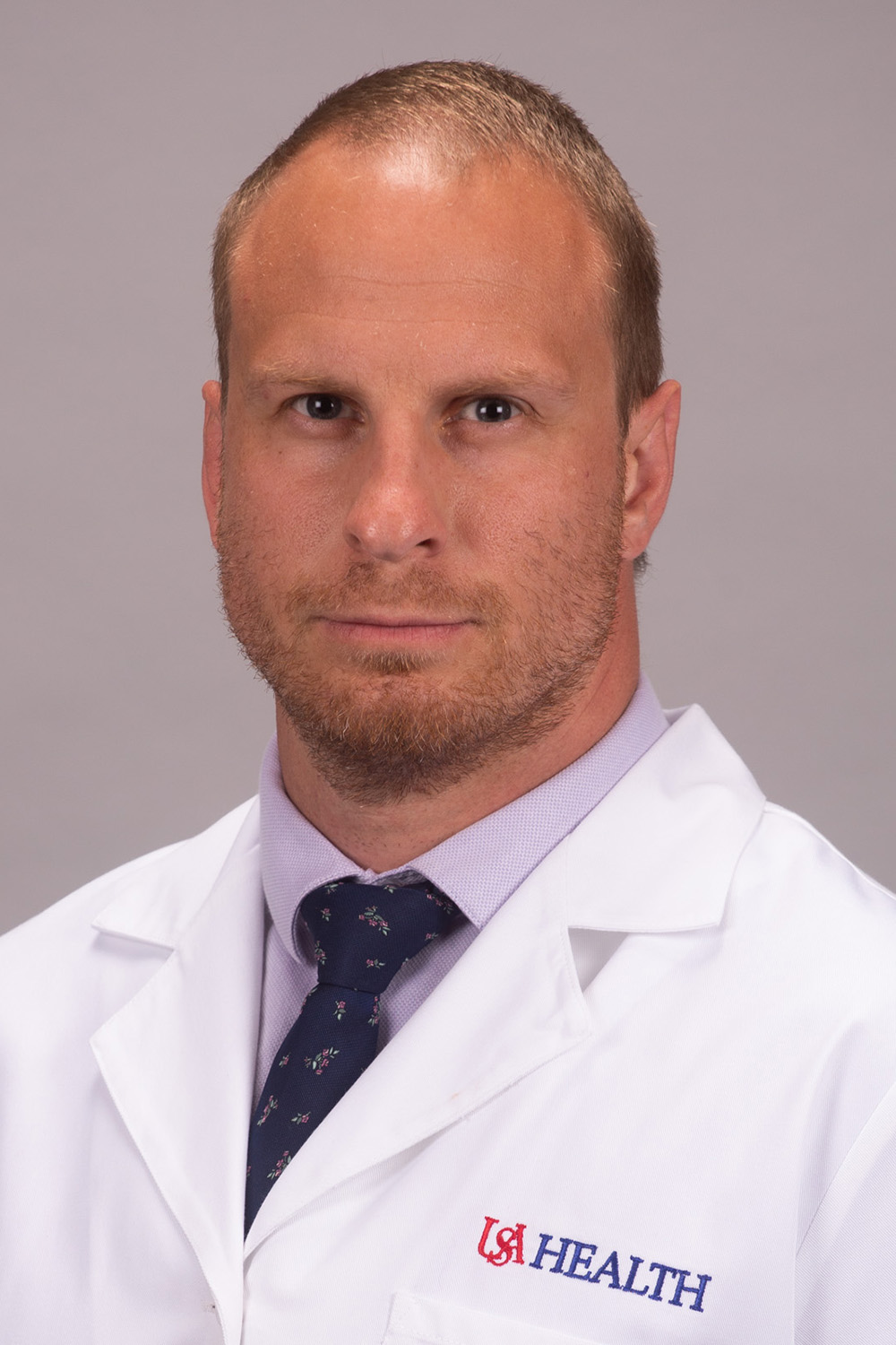 Gregory Heidel, M.D.